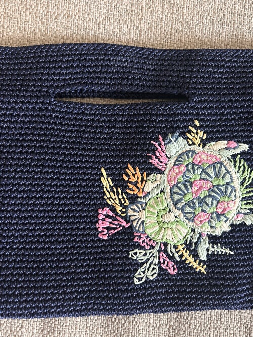 The Sak Navy woven clutch